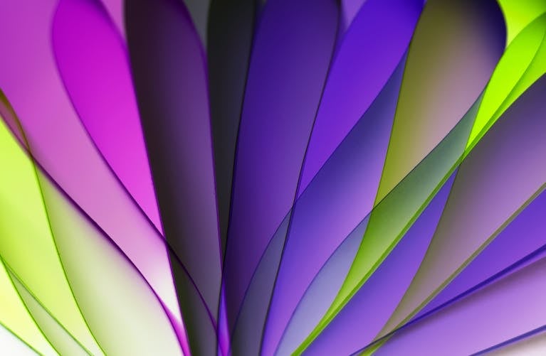 Dynamic abstract design featuring colorful paper layers creating a vivid and modern art piece.